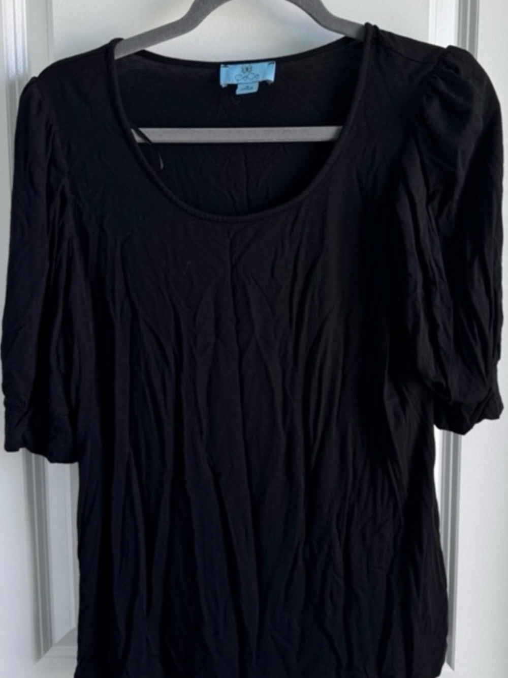 CeCe Black Tee with Teal Brand Label